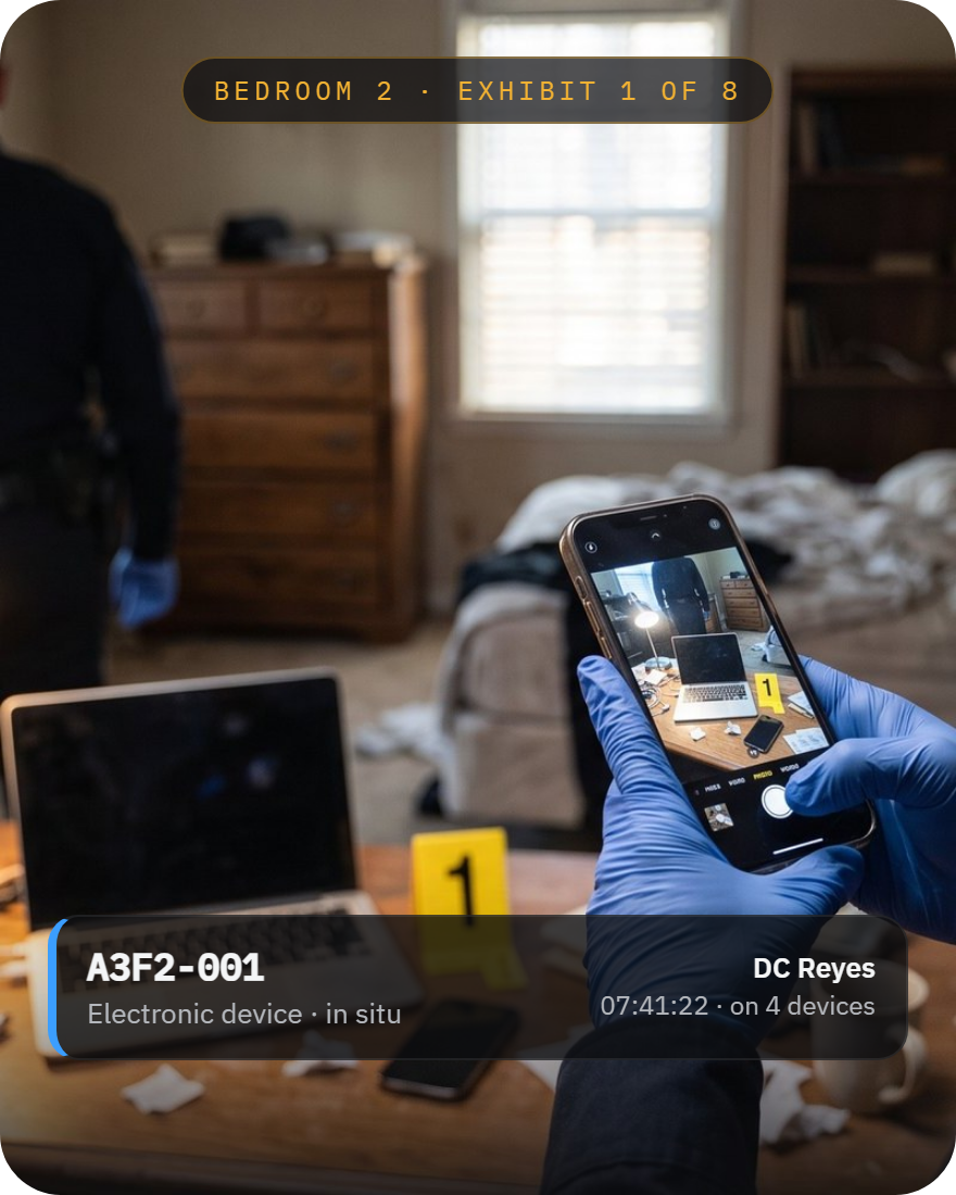 An officer photographs an exhibit in situ with SIP